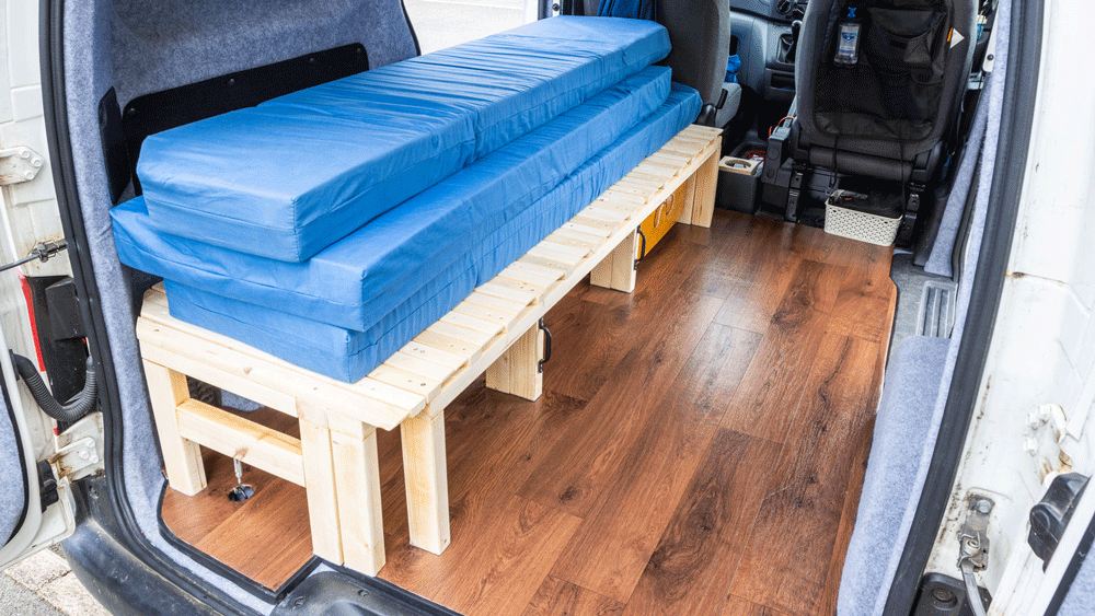 Animated gif showing the bed expanding and the mattress being laid out on top