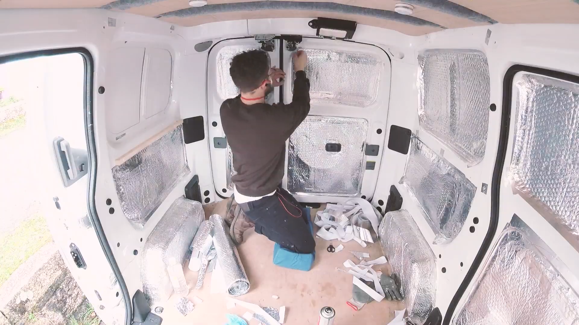 Insulating van walls with foil bubble wrap insulation