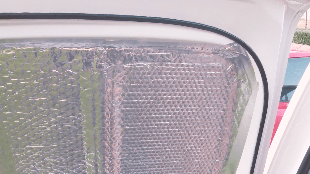 The finished rubber border on the van door