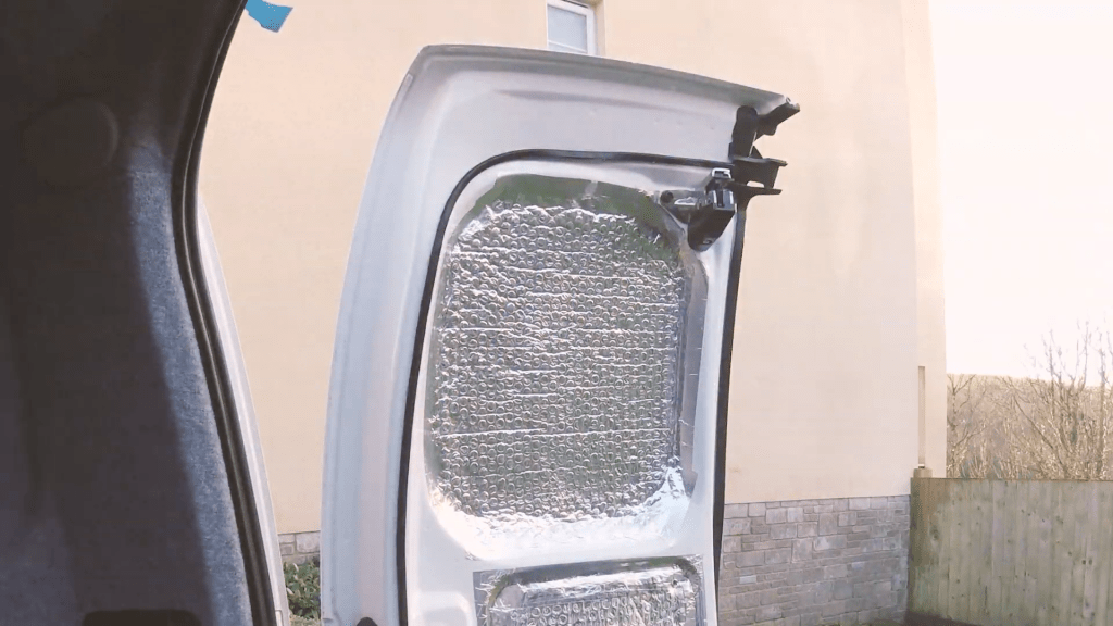 The finished rubber border on the van door