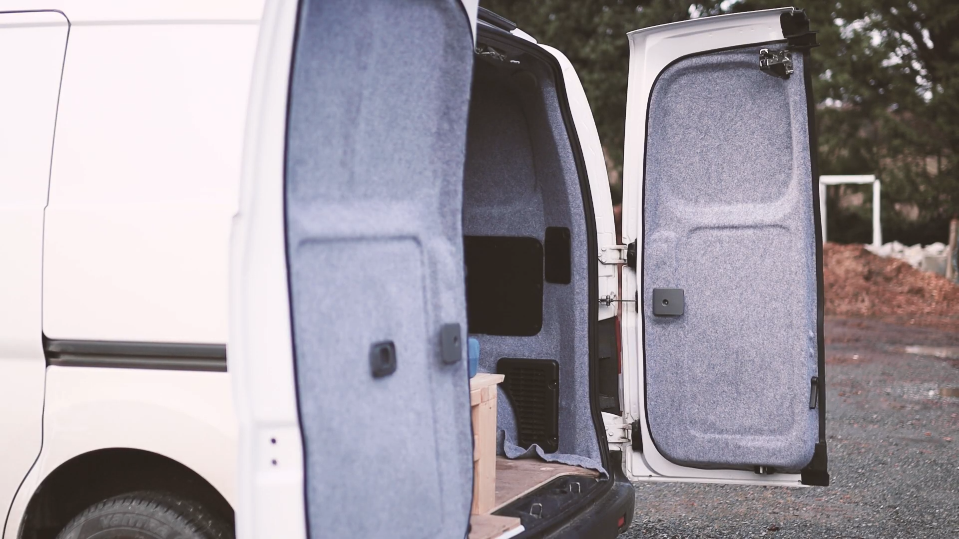 The carpeted van doors