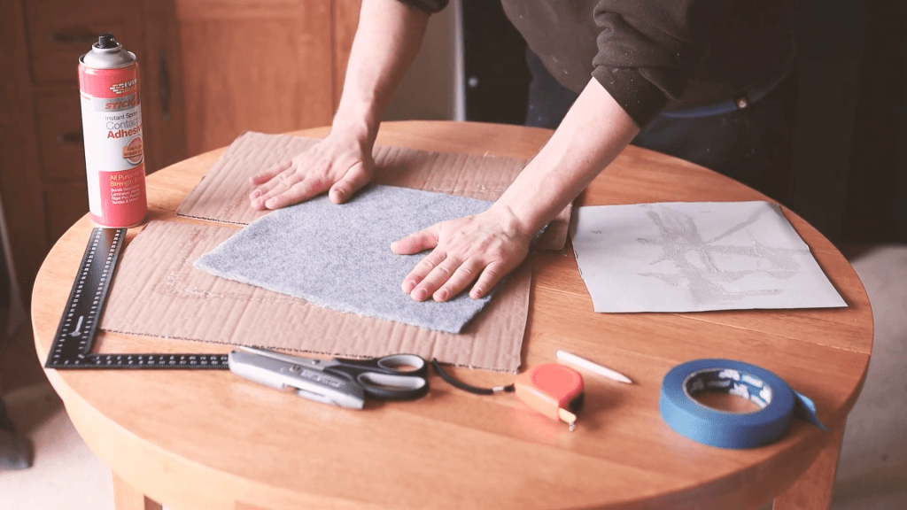 Applying pressure to the carpet and card