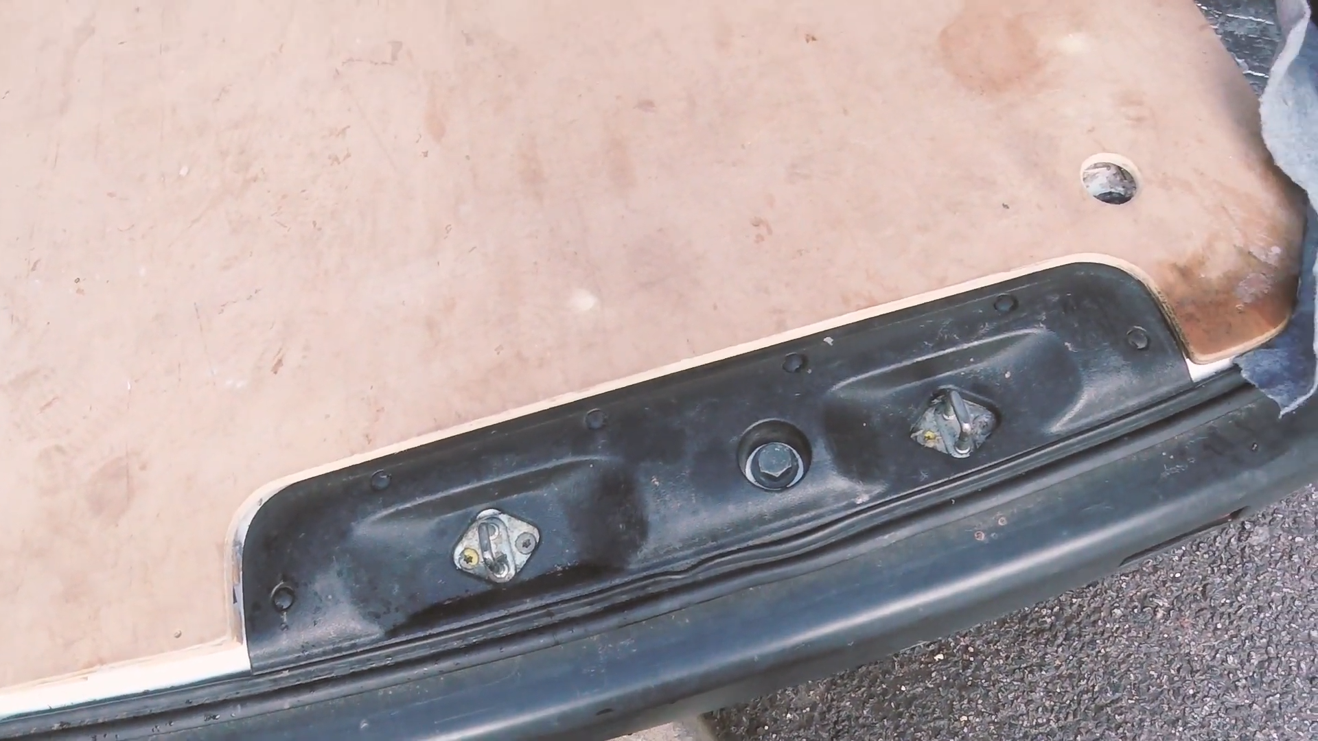 The back edge of the van floor