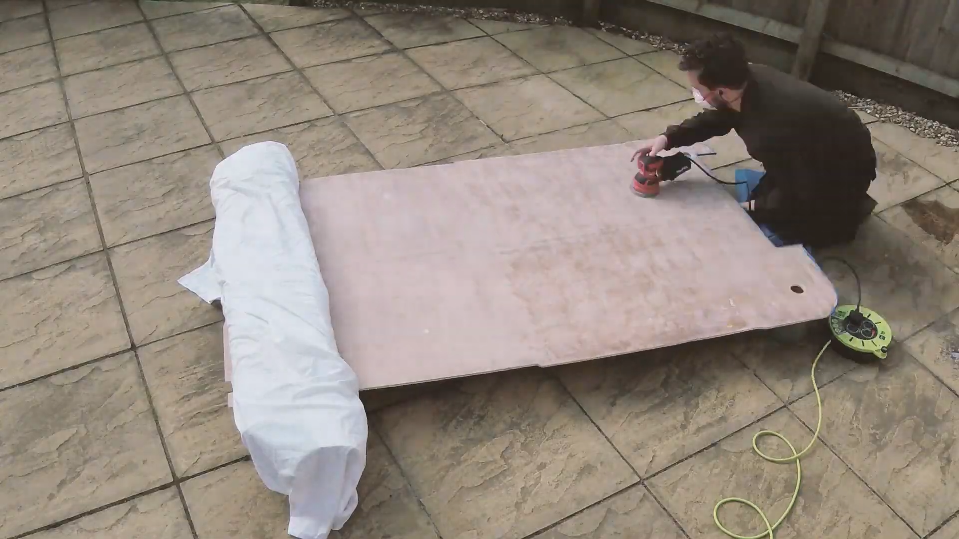 Sanding adhesive off the plywood