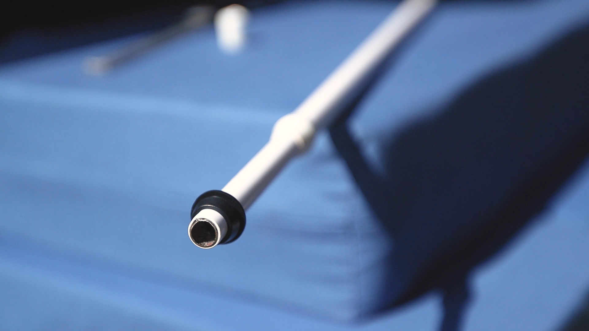 A rubber grommet on a tension rod