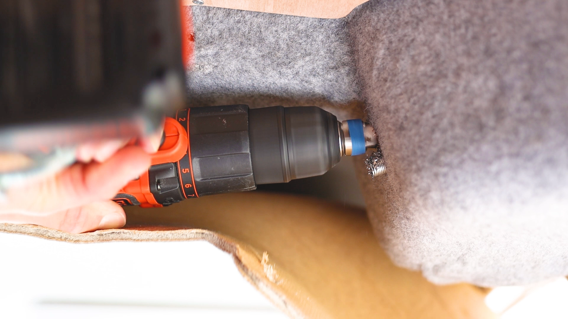 Drilling a hole in the van