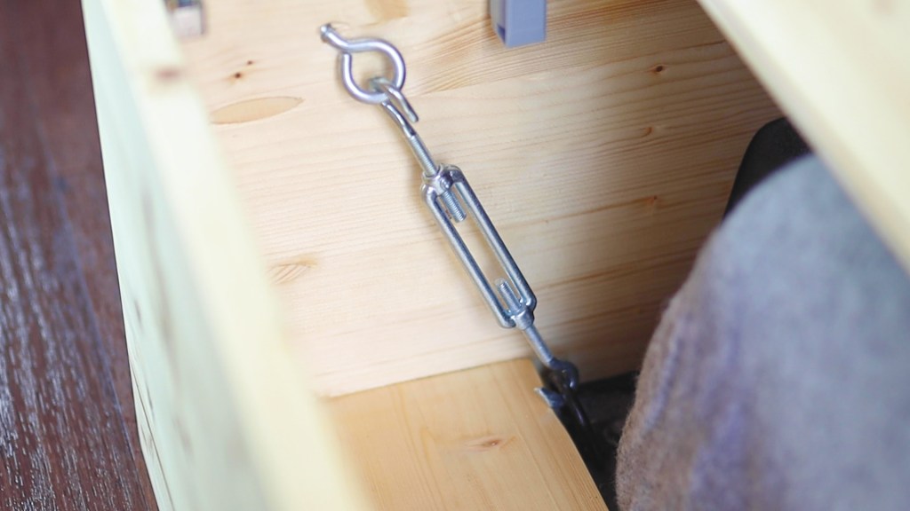 Turnbuckles holding the van furniture in place