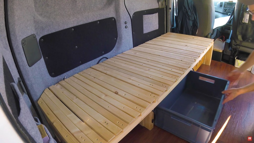 Putting the new van storage boxes under the pullout bench bed