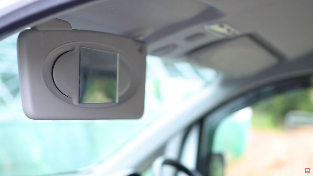 Sun visor mirror installed in a Nissan NV200