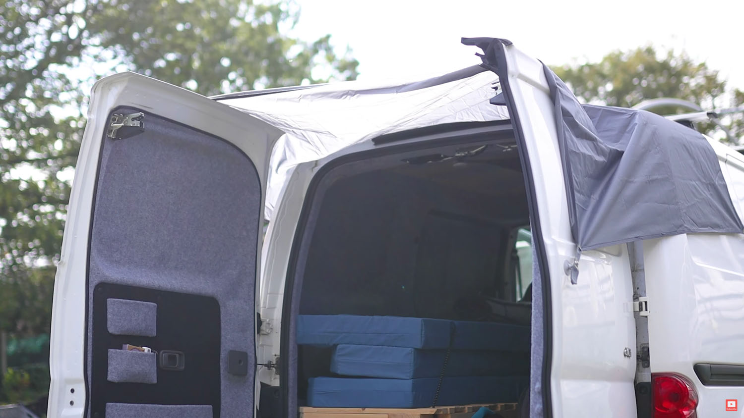 Barn door van rain awning