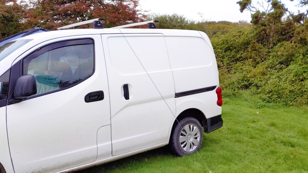 Guy ropes pulled over the van