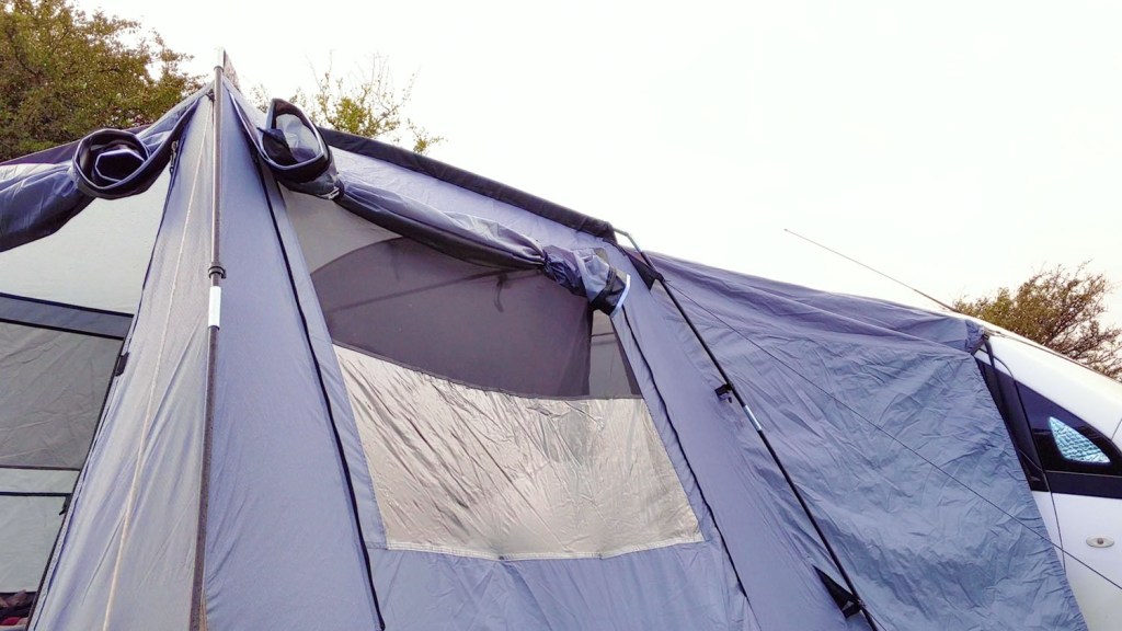 Roll up mesh and plastic windows on the van awning