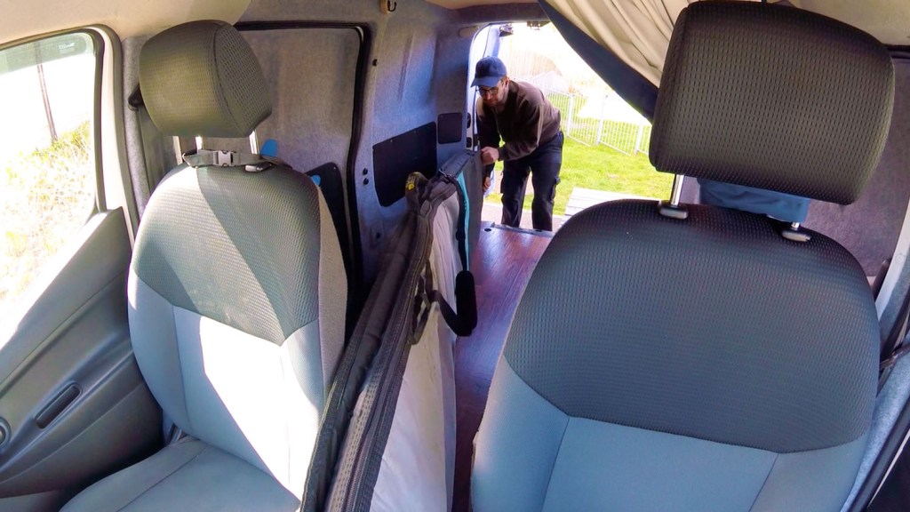 Being able to store my 9'5" surfboard in the van is an essential requirement for my Nissan NV200 build