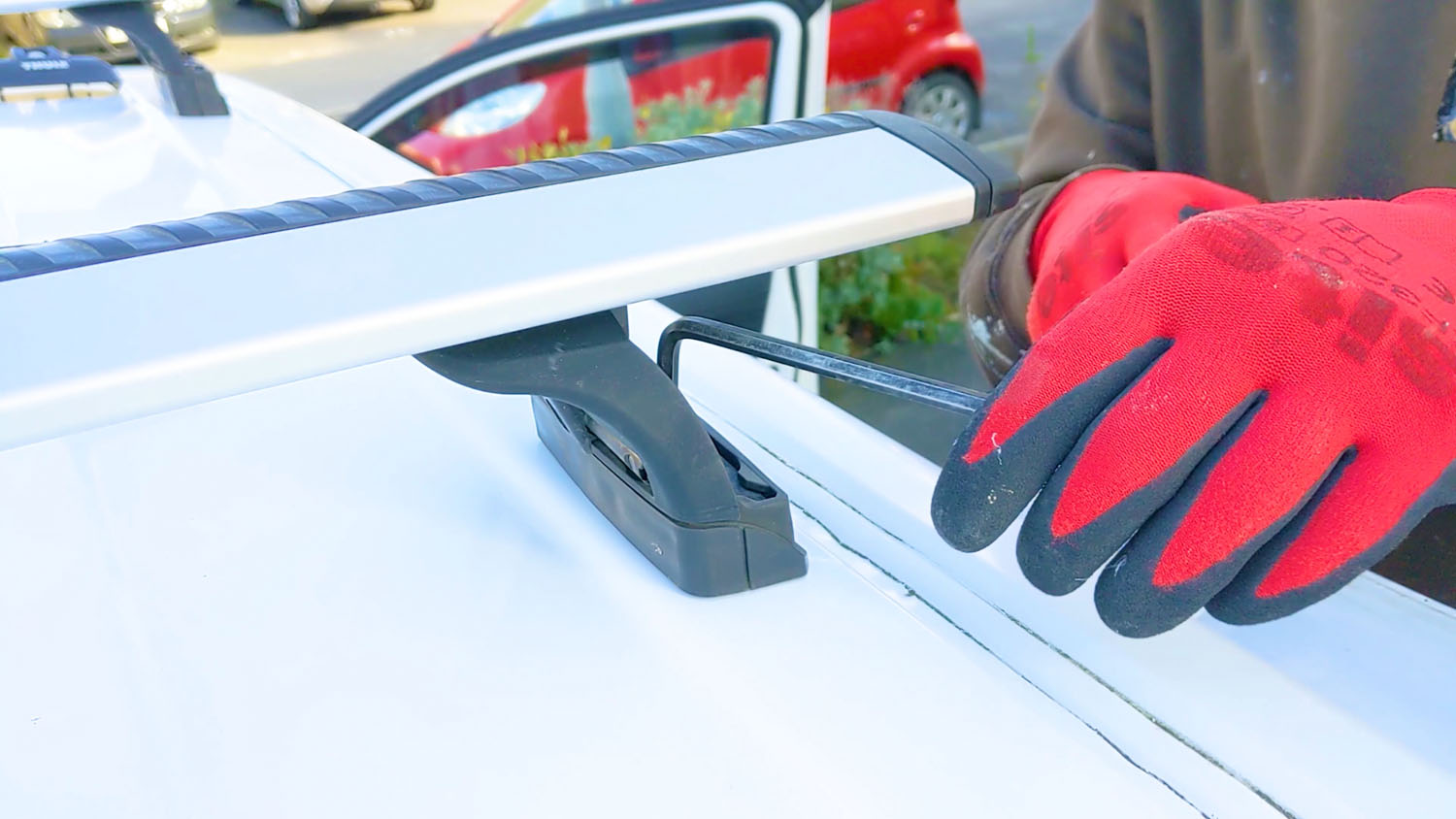 Reattaching the roof bars to the van