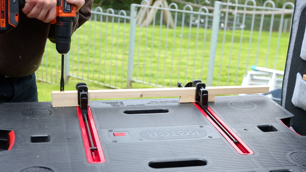 Drilling recesses and holes for bolts in a length of wood