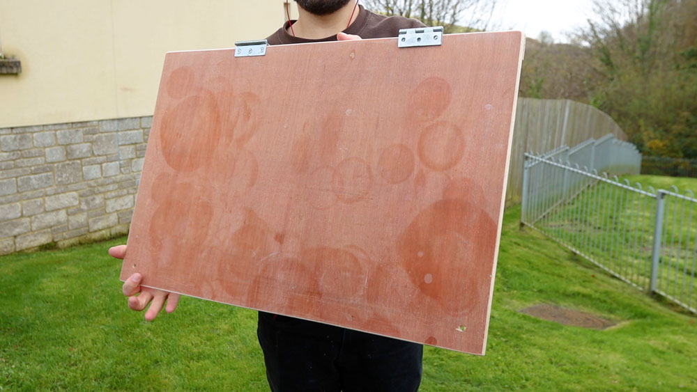 My original - well used - van table made of plywood and hinges