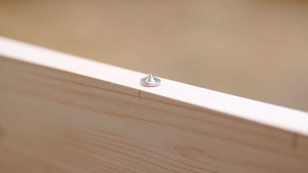 Dowel pin in the edge of the furniture board