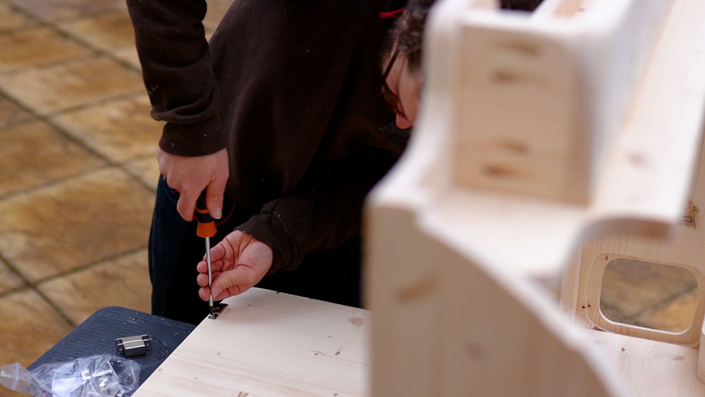 Screwing magnets to the table