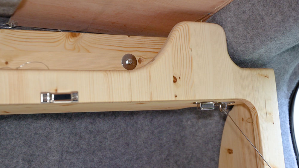 Table unit bolted onto the van wall