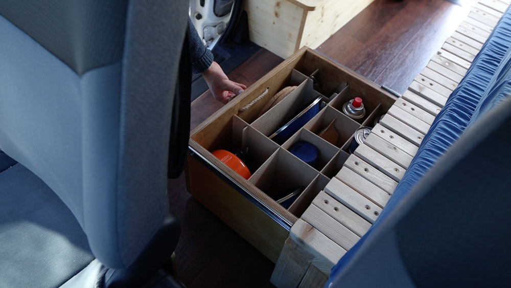 Van essential now stored neatly under my pull out bed