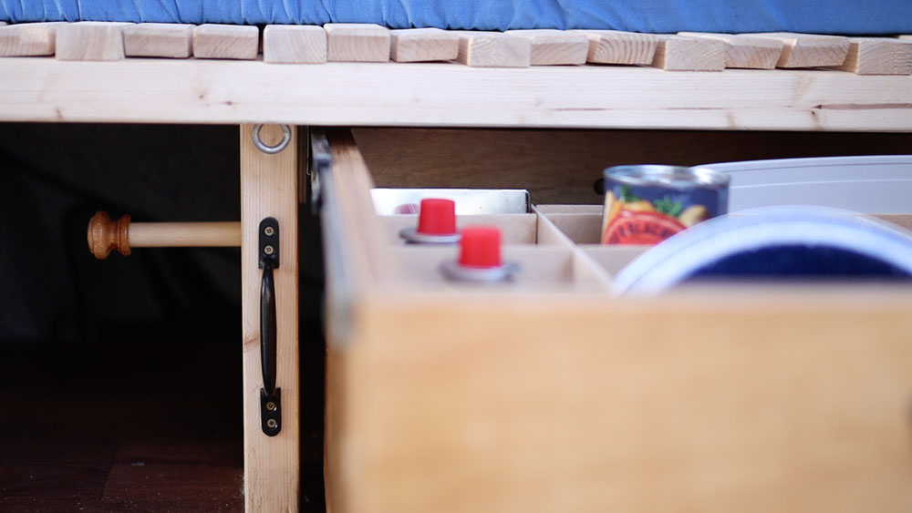 Van essentials under my pullout bed