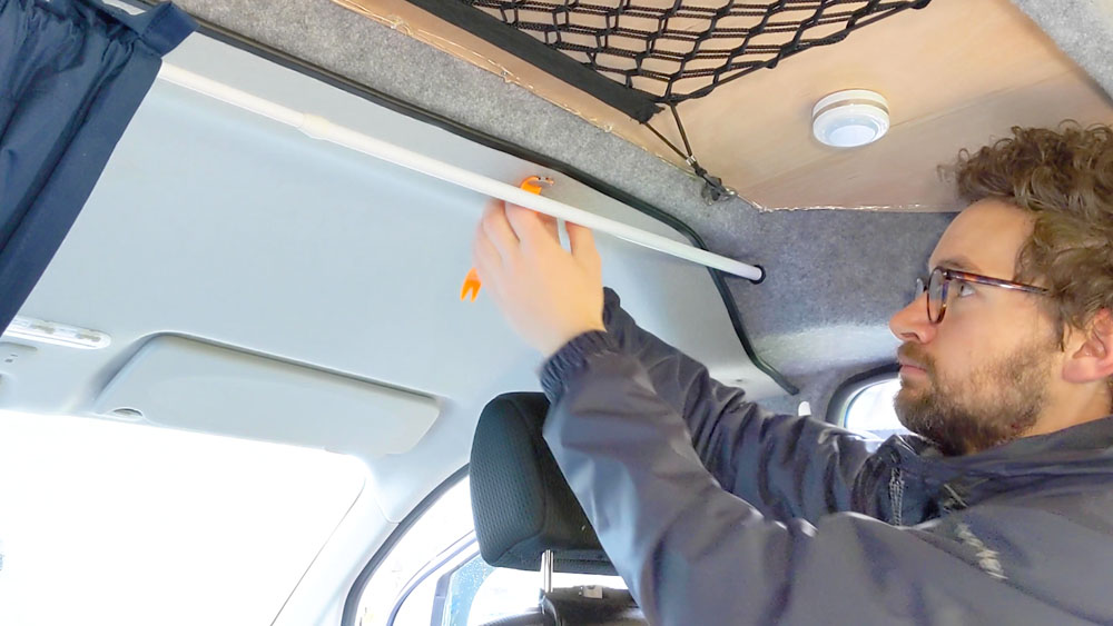 Removing the headliner trim clips with a trim removal tool
