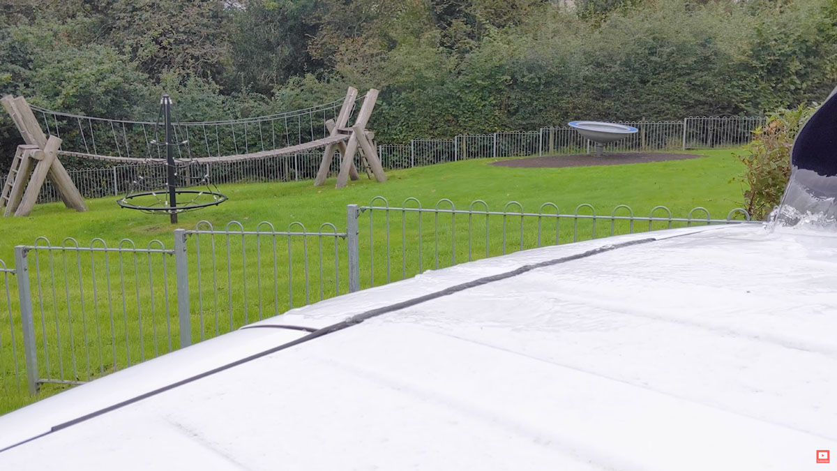 Testing the door seal with a bucket of water