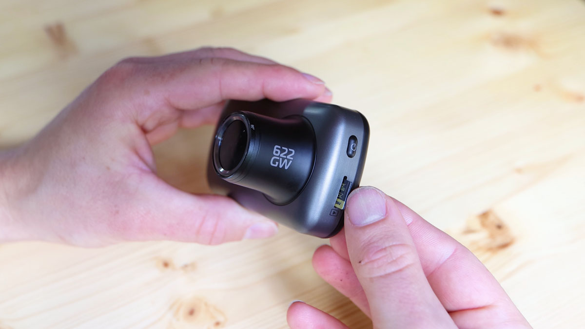 Inserting a 256GB micro SD memory card into the dash cam