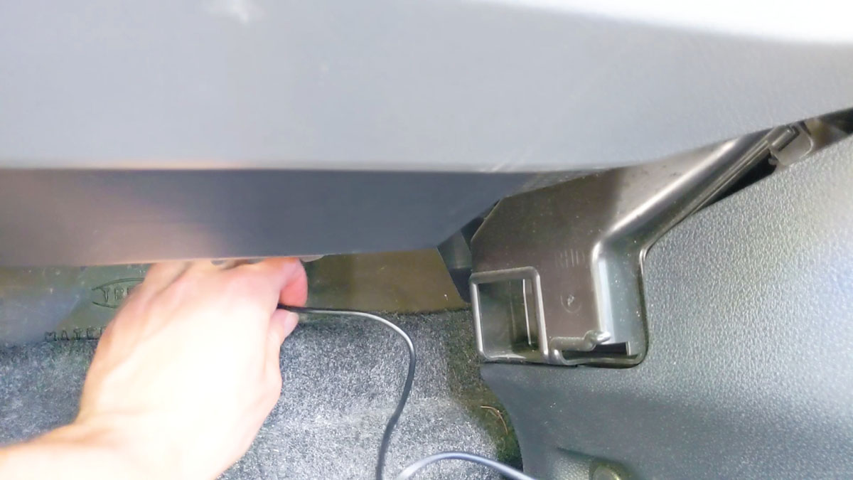 Routing the dash cam cables through the passenger footwell