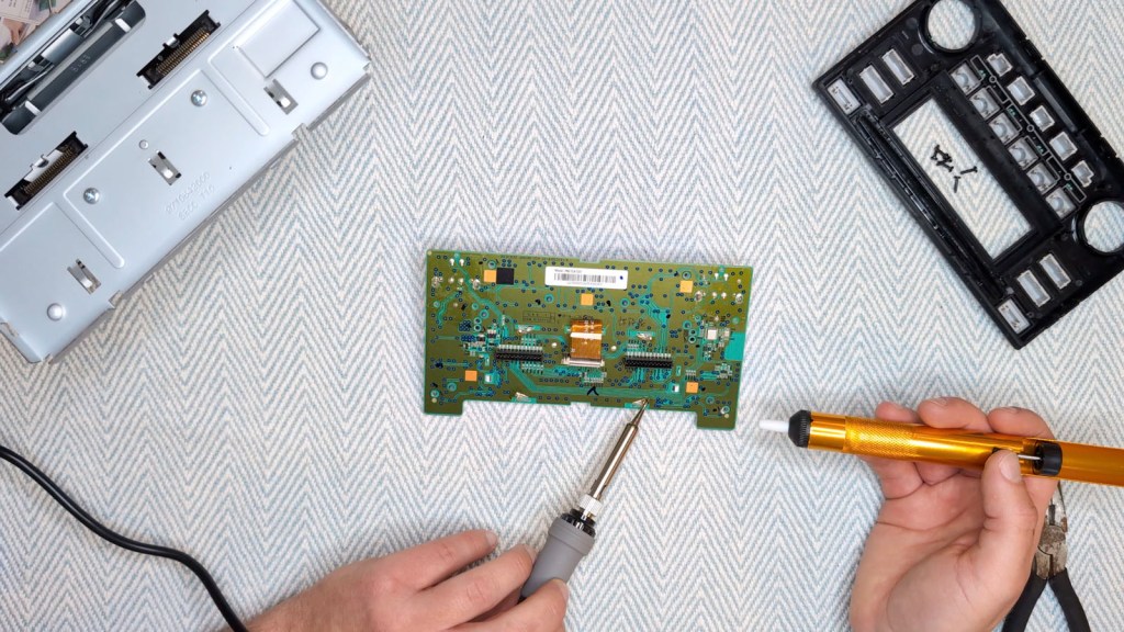 Removing solder form the Nissan Daewoo circuit board