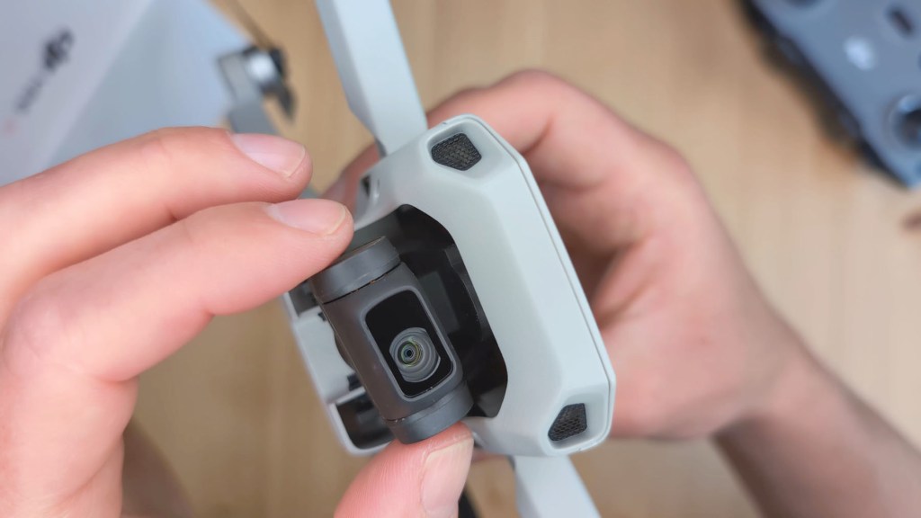The stabilised camera gimbal of the DJI Mini 4k Camera Drone