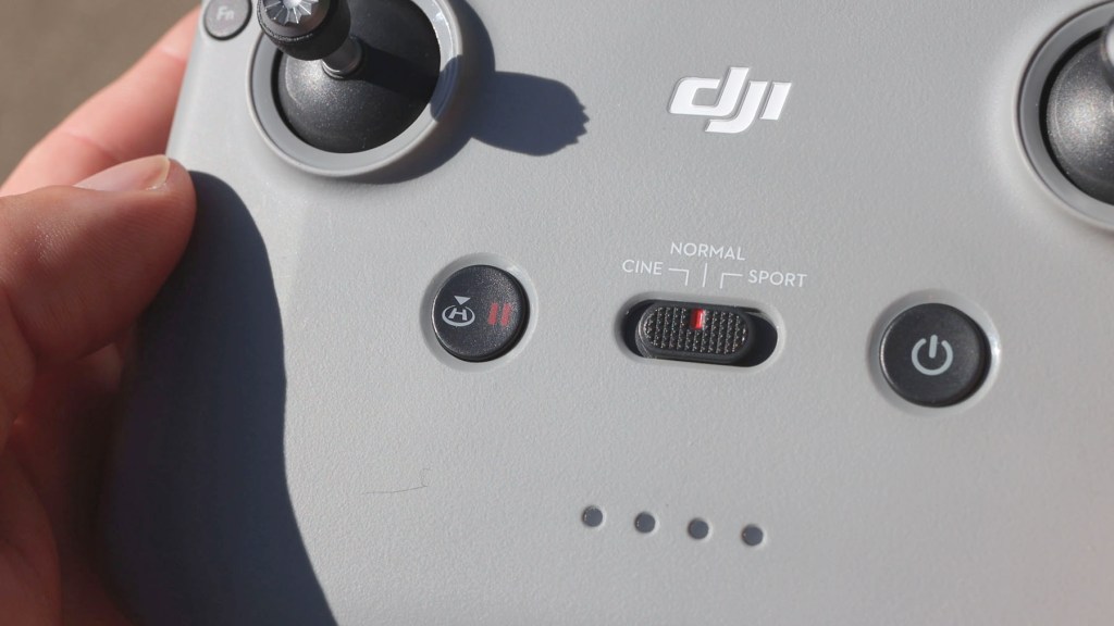 The RTH Return To Home button on the DJI RC-N1c Remote Control for DJI Mini 4k