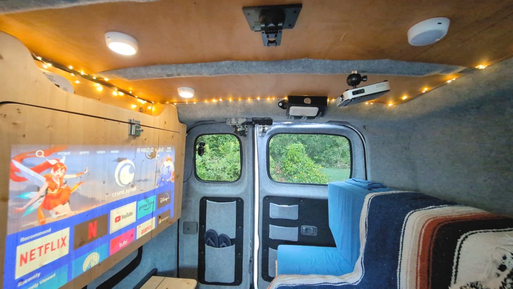 Nissan NV200 tiny camper van with Wimius Q3 projector installed on the ceiling
