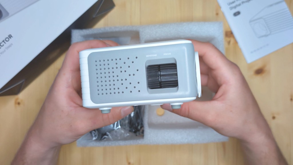 Speaker and dial side of the Akiyo O1 projector